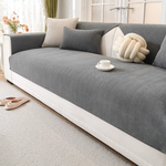 Charcoal gray herringbone chenille sofa cover on white modern sofa - neutral home decor